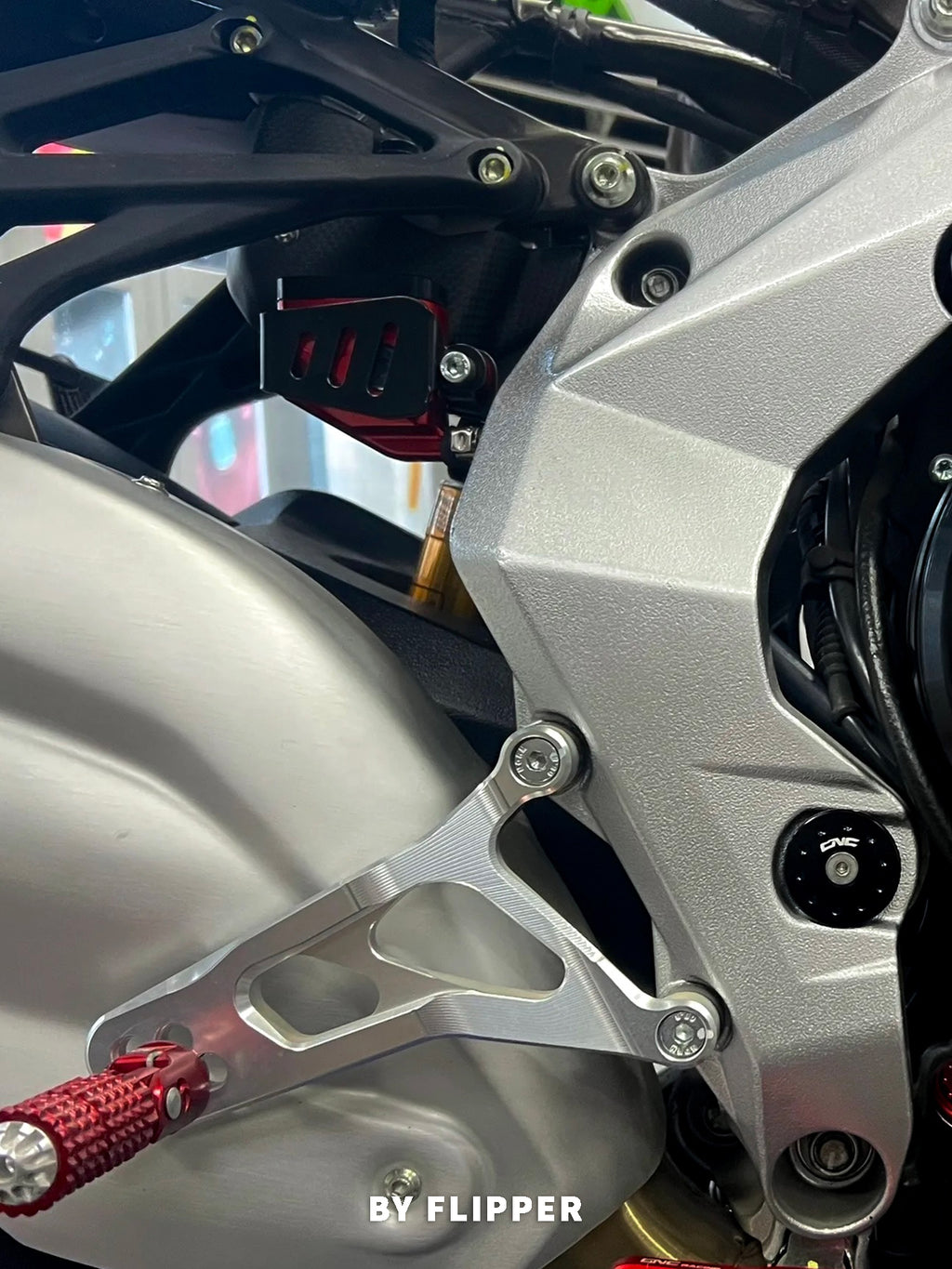 Close-up of a MV Agusta rear reservoir heat guard