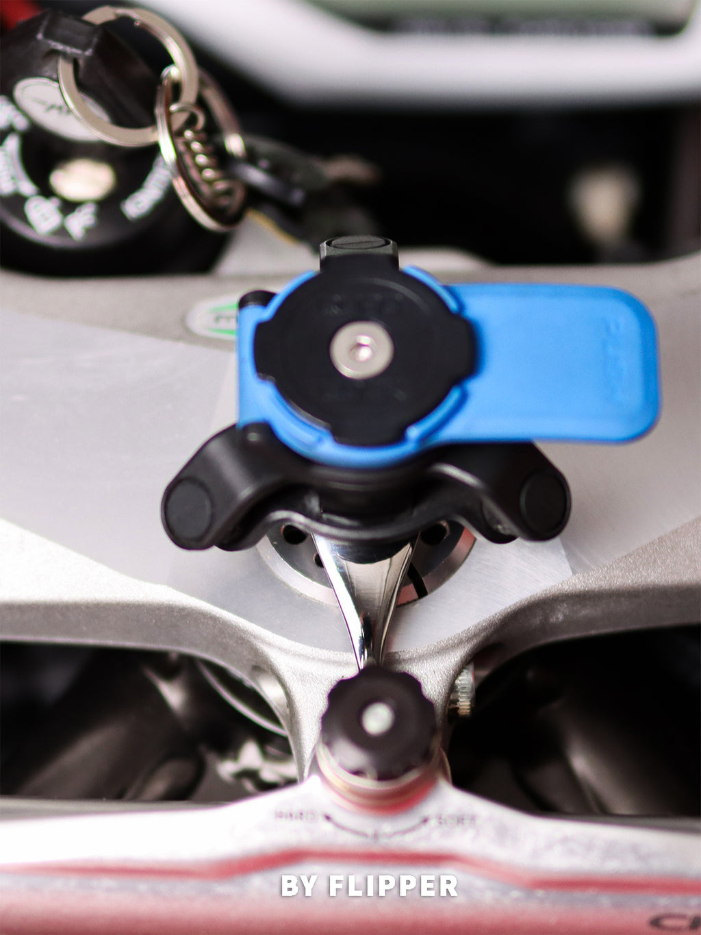 Close-up of MV AGUSTA F4's phone mount system from 'FLIPPER'