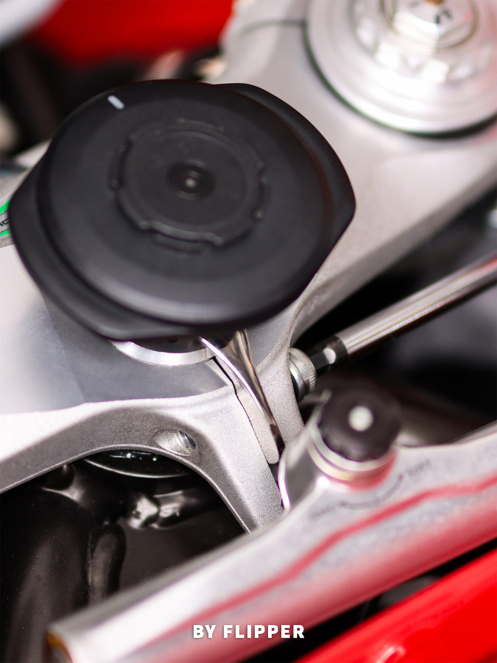 Close-up of MV AGUSTA F4's phone mount system with Quadlock from 'FLIPPER'