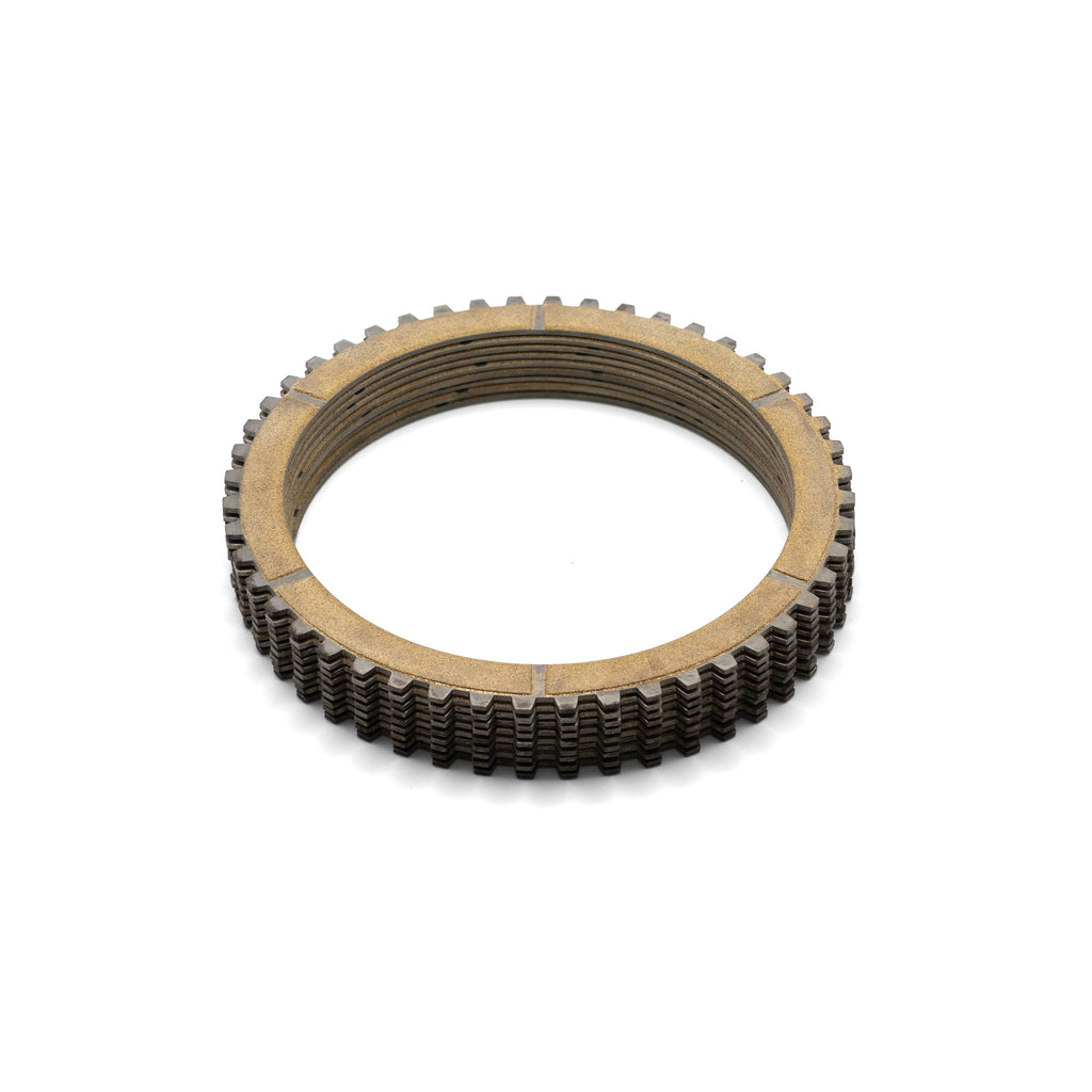 100% sintered friction clutch plate featuring an uprated copper, iron, and graphite matrix directly fused onto a hardened steel core.